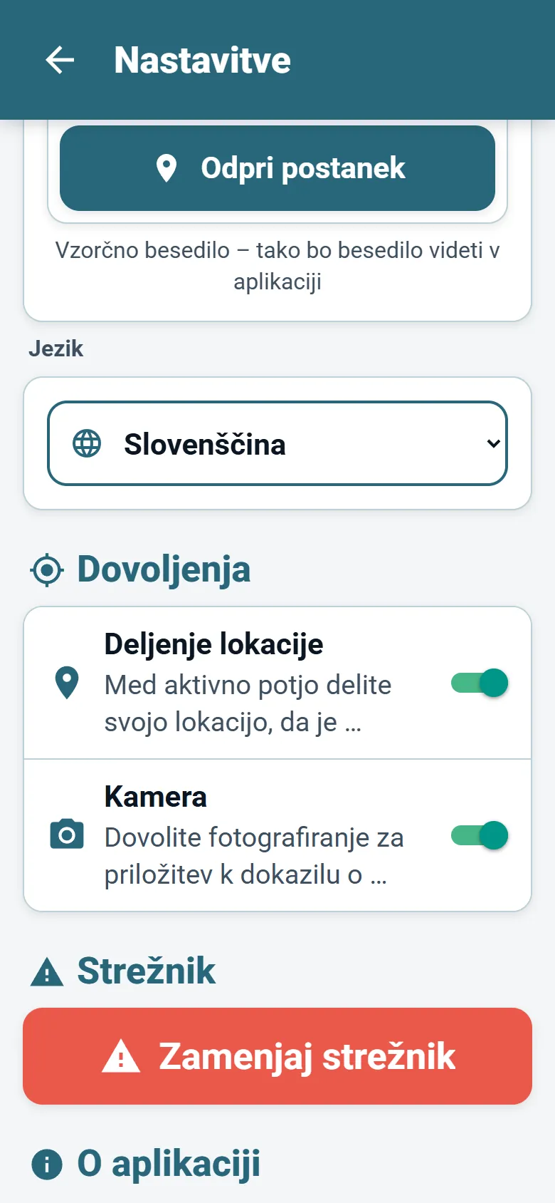 Meni aplikacije OptiRoutes za voznike z izbirnikom jezika in možnostmi načina prikaza